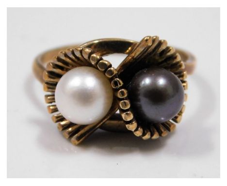 A 9ct gold ring set with pearl, size N. 3.8g