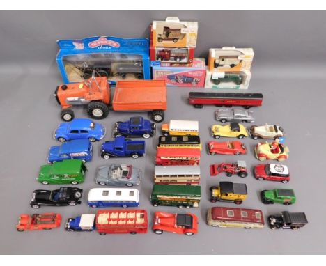 A quantity of mostly diecast toy vehicles including a Mogul tractor &amp; trailer