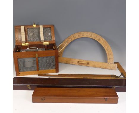 A vintage wooden cased Rolling Ruler,&nbsp;marked 'Stanley Great Turnstile. Holborn. London', 46cm long, together with anothe