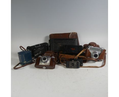 A vintage Kodak No. 3A folding Camera, in leather fitted case stamped 'J. B. Watson, Opticians Edinburgh', together with a qu