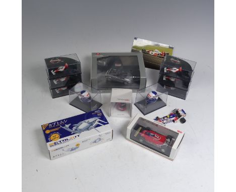 Six cased Minichamps (Paul's Model Art) 1:87 scale McLaren MP 4/4s, 'A. Senna World Champion 1988', together with two Minicha