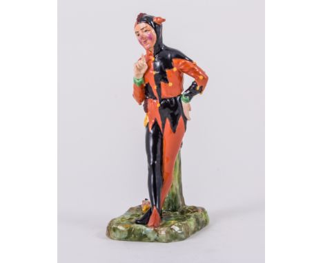 Royal Worcester, 'Jester',  Model No.2213, in orange and black colourway, on green base, Pottery backstamp with date mark for
