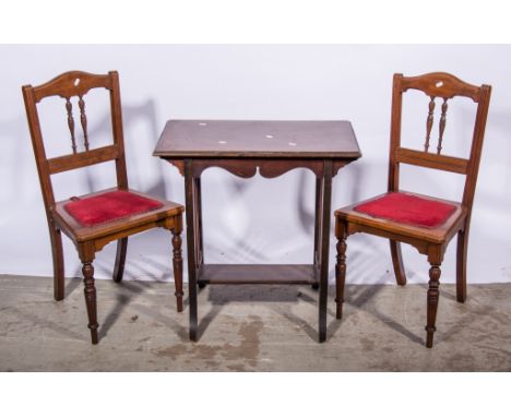 Edwardian walnut occasional table, rectangular top with a moulded edge, square tapering splayed legs, joined by a shelf, slat