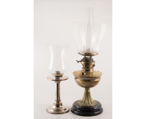 Edwardian oil lamp, etched shade with chimney, circular base, 59cm; another table lamp; two hurricane lamps; and a table lamp