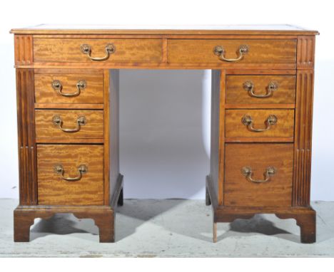 Mahogany twin pedestal desk, by Gillow, leather inset top, moulded edge, twin pedestals, fitted with eight drawers, fluted ou