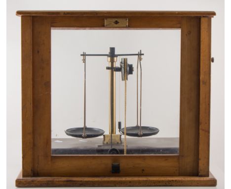 Griffin and Tatlock microid scales, stained beech and glazed case, width 46cm.