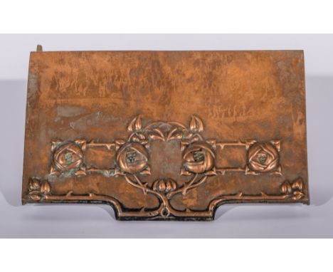 An Arts and Crafts copper stove hood, circa 1900, cast with Glasgow style roses, overlaid on a wrought iron bracket, cast to 
