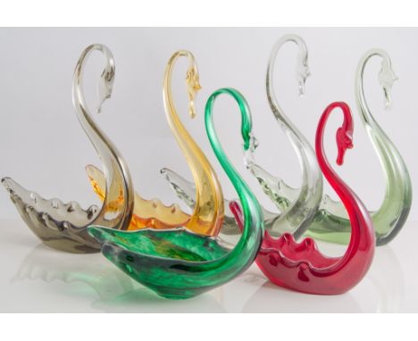 Whitefriars, five glass swans, four various colourways, 20cm high, and one small ruby colourway, 15cm; with a sixth swan prob