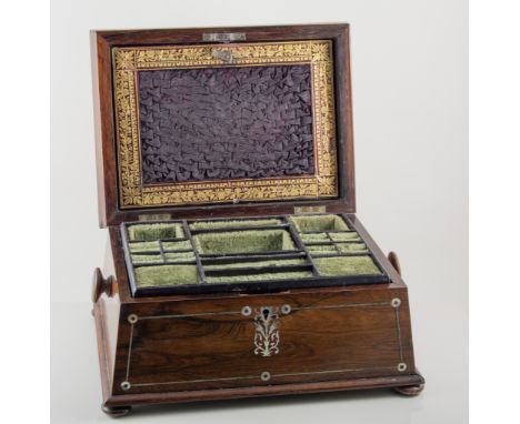A ladies rosewood jewel casket, inlaid with mother-of-pearl, architectural top, four stud feet to base and stud handle to eac
