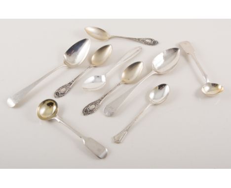 Collection of silver spoons and one fork.