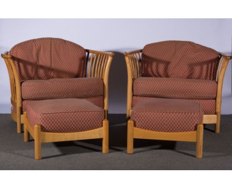 An Ercol light ash lounge suite, Renaissance design, slatted frames, loose cushions comprising two-seater settee, two armchai