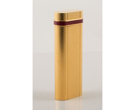 Le Must for Cartier, gilt metal lighter.
