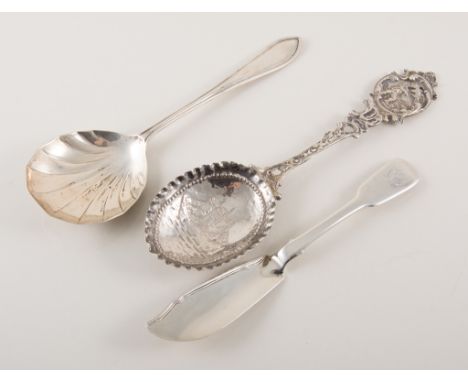 Dutch cast silver spoon, a set of 'Apostle' teaspoons and other silver cutlery together with a ladle.