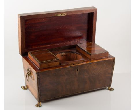 Regency inlaid mahogany tea caddy, sarcophagus form, gilt metal lion ring mask handles, and paw feet, fitted interior with tw