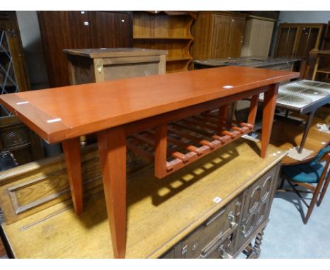     A Mid 20th Century Coffee Table With Magazine Shelf                             