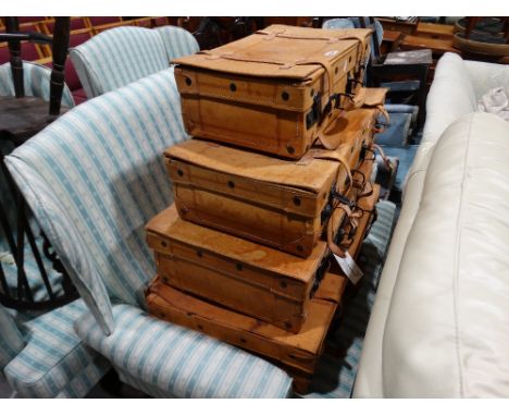    A Set Of Four Stitched Leather Vintage Style Suitcases                          