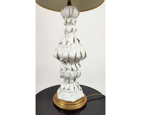WHITE PORCELAIN SIDE LAMP, in a leaf design on a gilt base, 80cm H overall including shade. 