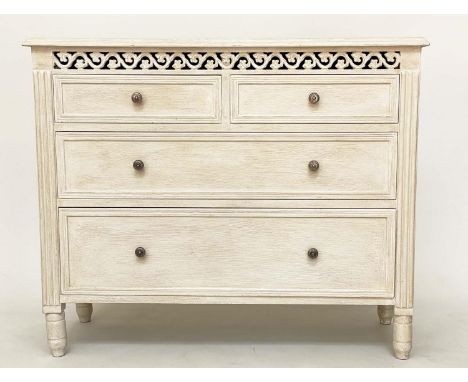COMMODE, French style traditionally grey painted with pierced frieze and four drawers, 75cm H x 89cm W x 36cm D. 