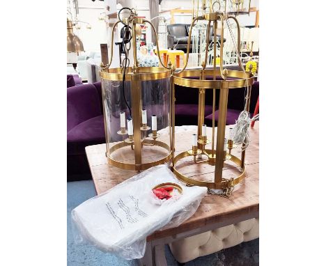LANTERNS, a pair, gilt metal and glazed, four branch light 78.5cm drop minus fittings. (2) 
