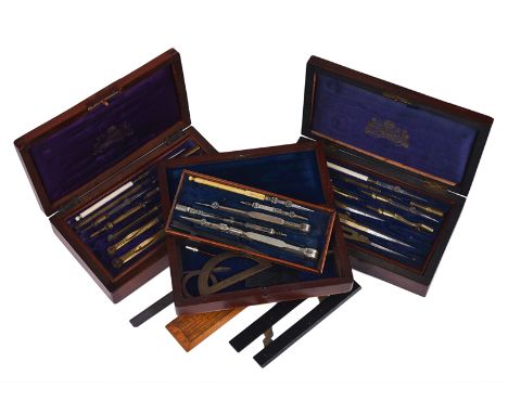 Ø 19TH-CENTURY DRAWING SETS, comprising an 8½in. diameter French single tray set with brass and steel instruments, the lower 