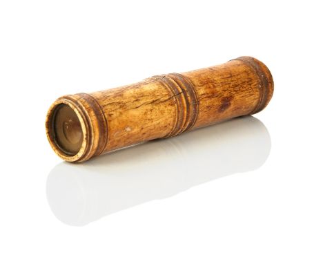 A FIXED FOCUS SPYGLASS, PROBABLY DUTCH, CIRCA 1650, unsigned, constructed from two bone sections in the form of bamboo and jo