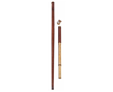 A TELESCOPE SYSTEM STICK, CIRCA 1840, the plain tapering rosewood shaft with worked gilt brass divider, threaded ‘handle’ con