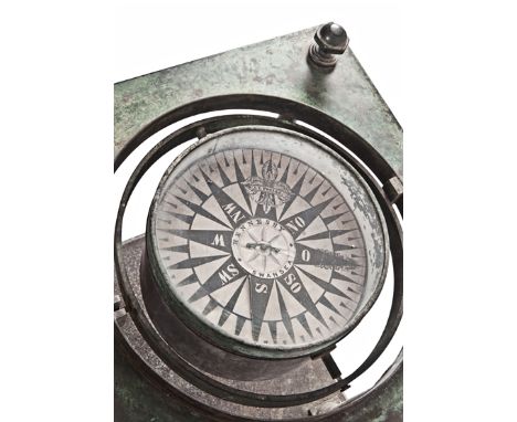 A RARE BRASS SHIP’S BINNACLE COMPASS BY HENNESSY, SWANSEA, CIRCA 1850 OR EARLIER, the 8in. dry card compass signed as per tit
