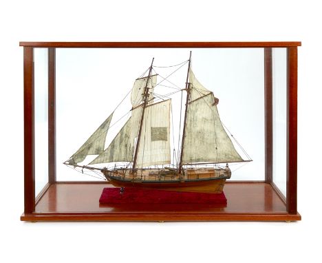 AN ATTRACTIVE 20TH-CENTURY SCALE MODEL OF THE AMERICAN REVENUE CUTTER DALLAS [1815], the carvel planked hull with rudder and 