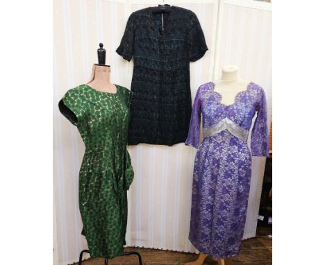 1950's green and gold brocade cocktail dress, a 1950's purple lace over cream satin cocktail dress with a satin detail to the