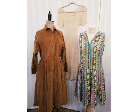 A needlecord brown dress labelled Niba size 40, a crochet dress, a multi coloured shift dress, a printed cotton day dress gre