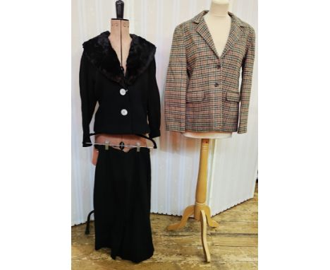 Black wool crepe suit no label with faux-fur collar, two button fastening and a straight skirt, a tweed jacket labelled 'Poll
