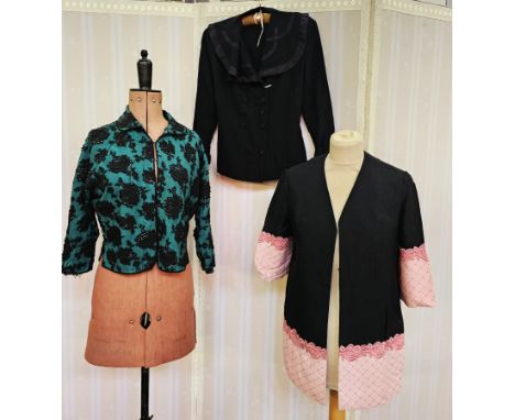 A mid century black net embroidered over turquoise wool jacket, a 1920's style linen jacket with pink linen cuffs and hem wit
