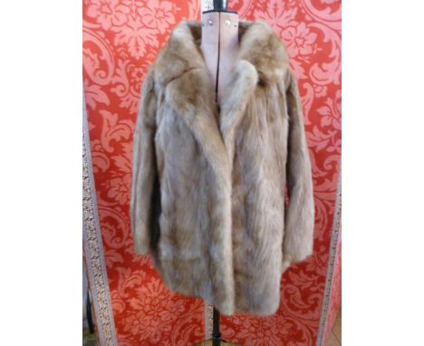 Mink three-quarter length coat, bell sleeves, embroidered lining, with a mink hat, a white coney hat, and a squirrel stole - 
