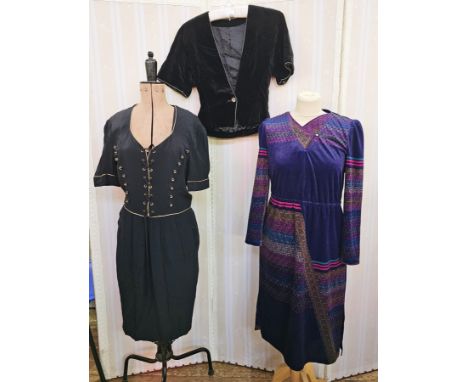 A navy cocktail dress with laced tie front with navy and gilt buttons and narrow gilt braid detail labelled Escada size 40, a