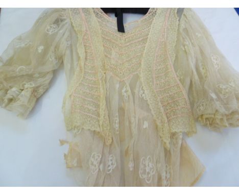 Various Edwardian lace blouses, one to include leg' o' mutton sleeves, a silk embroidered insert to the front, lace panels, m