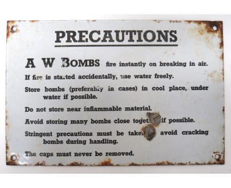 WW2 A.W. Bombs Enamel Plaque black and white enamel plaque for the inner lid of the "A.W. Bombs" lid. &nbsp;Some minor chips 