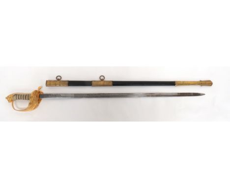 Elizabeth II Royal Navy Officer's Sword By Wilkinson 30 3/4 inch, single edged blade with fuller. &nbsp;Etched oak leaf and r
