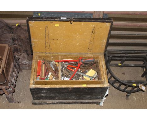 A wooden toolbox with interior tray and contents of various tools to include pliers, screwdrivers, spanners, an Eclipse No.20