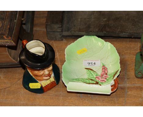 A Carltonware leaf dish and a Staffordshire character jog in the form of Winston Churchill 
