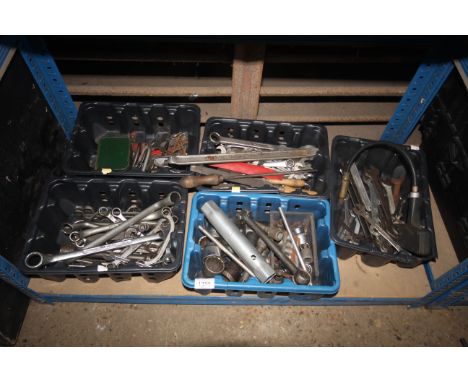 Five small tray boxes containing a variety of tools to include ring spanners, sockets, compression tester etc.