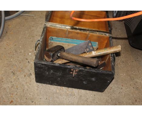 A wooden lockable tool box and contents of various tools to include mallet; a wooden handled hammer etc