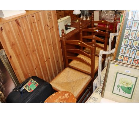 Three ladder back rush seated chairs