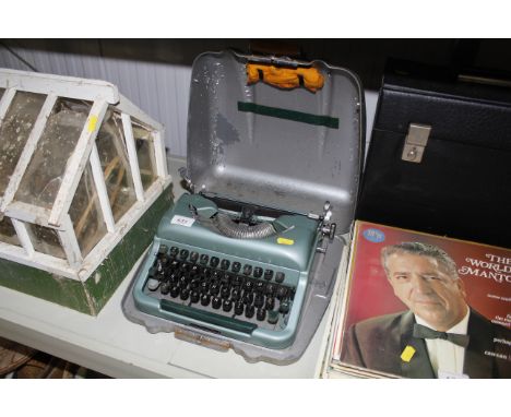 A Good Companion metal cased typewriter 