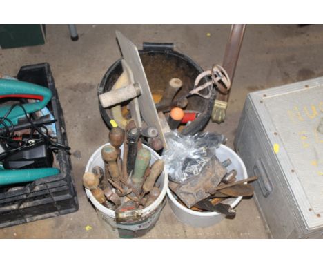Three buckets containing various tools to include an adjustable spanner; various screw drivers; plastering tools; an under wo