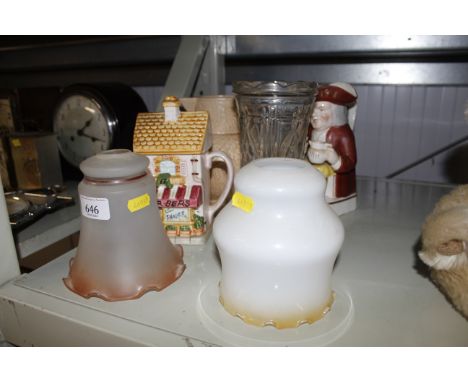 A novelty tea pot, character jug, two light shades etc 
