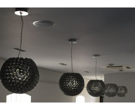 A set of seven modern hanging pendant style light fittings with three bulbs
Please note this lot is fixed in the current loca