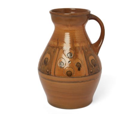 Moorcroft Art Deco peacock feathers pattern handled jug on mustard ground, circa 1938 Glazed ceramic Impressed makers stamp a