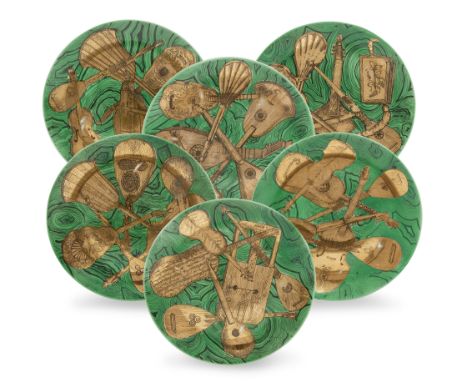 Pierro Fornasetti (1913-1988) Six 'Strumenti Musicali' pattern plates, circa 1960 Printed and gilt Arzberg porcelain plates E