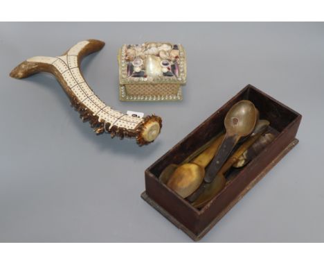 A stag antler cribbage board, a shell encrusted box and a collection of horn spoons cribbage board length 8cm