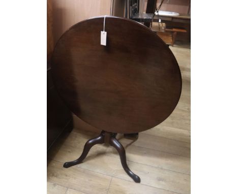 A George III circular mahogany tilt top tripod tea table Diameter 82cm